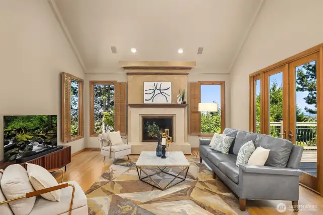 The windows bring in the light and the view, while a wood fire makes this space so cozy in the winter months.