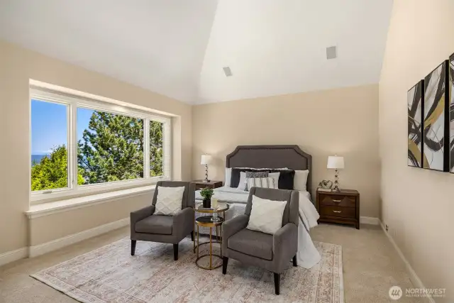 The majestic beauty of the home continues with a huge primary suite that offers view of Lake Sammamish and Lake Washington, and let's not forget Mt Baker! A little tree trimming would completely open up the view - HOA and City of Bellevue approval may be required.