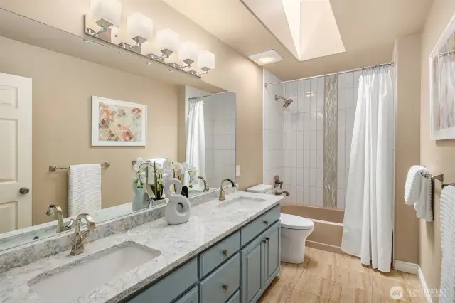the refreshed family bathroom is shared between just two bedrooms.