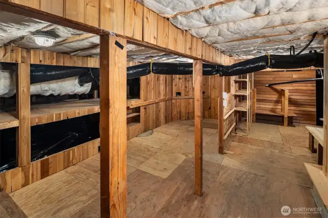 Large, full height storage area under the house, accessed under the deck. Such a great space for outdoor gear, Holiday storage and more. Fully weather proof.