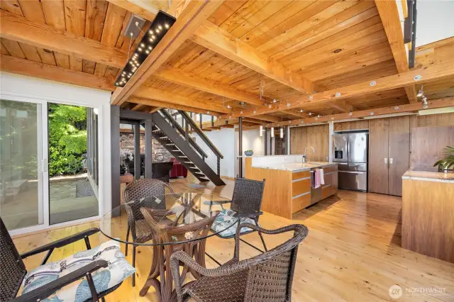 Dining area with access to the deck and patio.