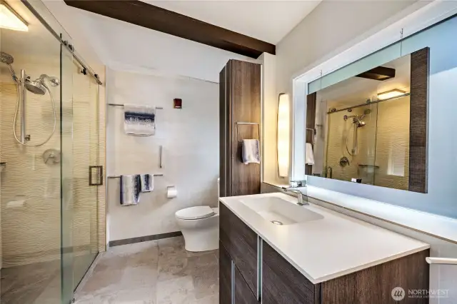 Upper level bath with glass shower.