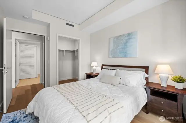 Walk-in closet and door to hall bathroom.