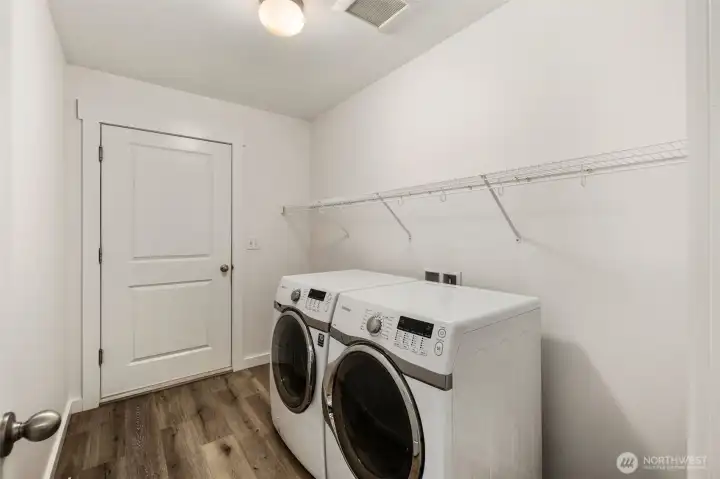 Laundry off the garage, near primary.