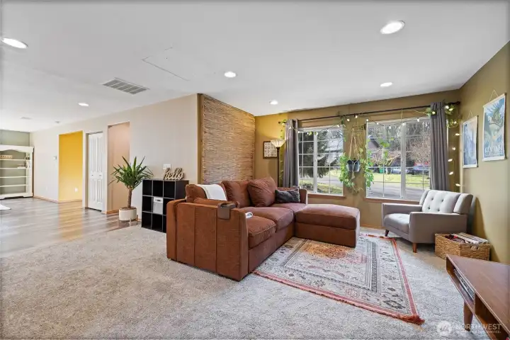 The closet houses the water heater (2025) & furnace. Sellers found that placement of sofa most useful for the TV .