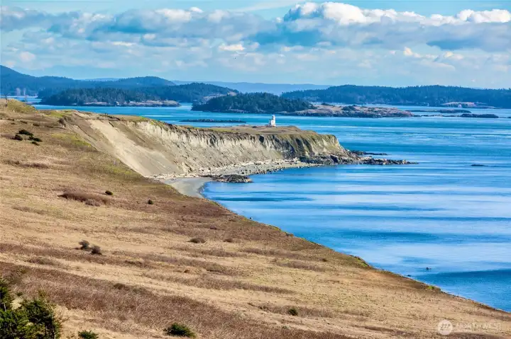 Iconic San Juan Island coastal scenery near Cape San Juan, featuring sweeping blufftop vistas, protected shoreline, and serene Pacific Northwest beauty just moments from the property.
