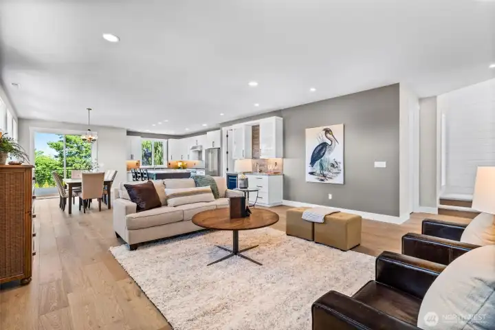 A 2nd view of the great room, looking back at the kitchen & dining area.
