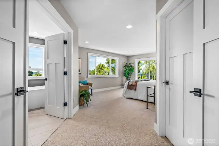 Double door entry to Primary Suite...you can already see the water views from each window.