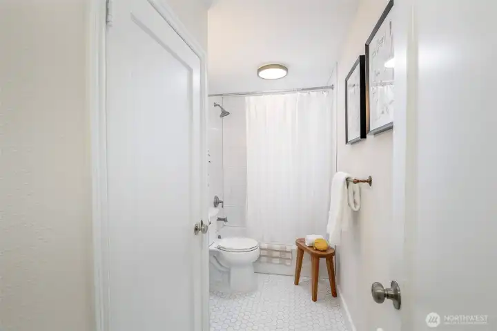 Freshly updated bath with modern touches.