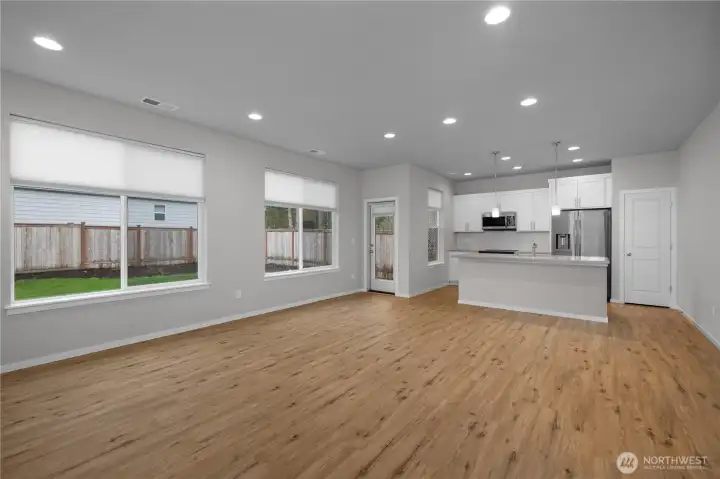 Dining area with direct access to the backyard, perfect for indoor-outdoor living.
