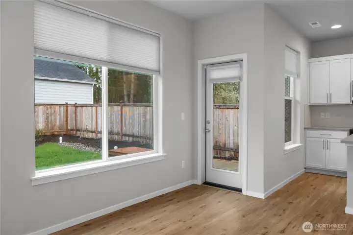 Convenient access to the covered area leading to the expansive patio.