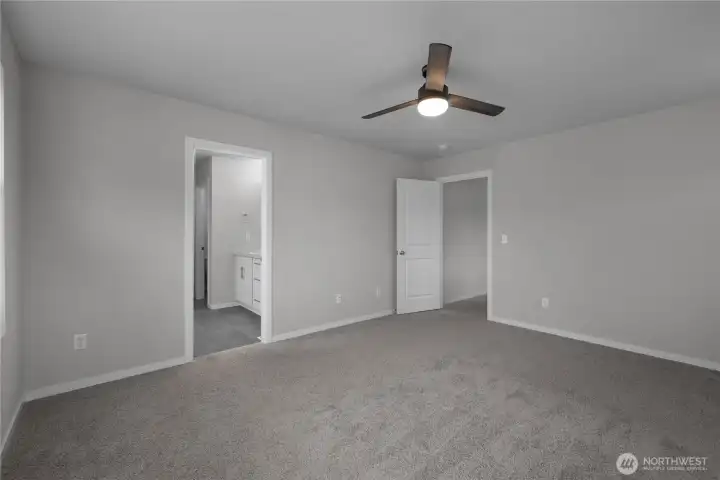 Generous primary bedroom with clean finishes and plenty of room to relax and unwind.