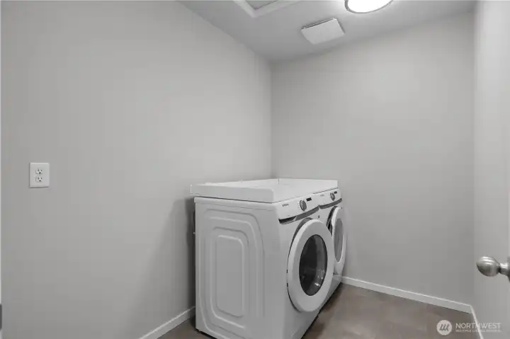 Dedicated laundry room with full-size washer and dryer upstairs.