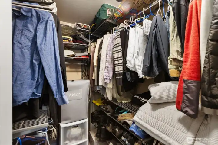 walk-in closet with shelving system.