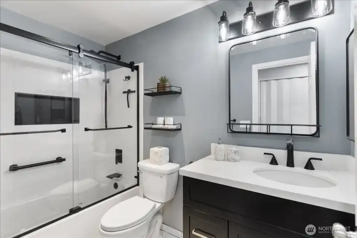 Main bath, nicely updated for all your needs.