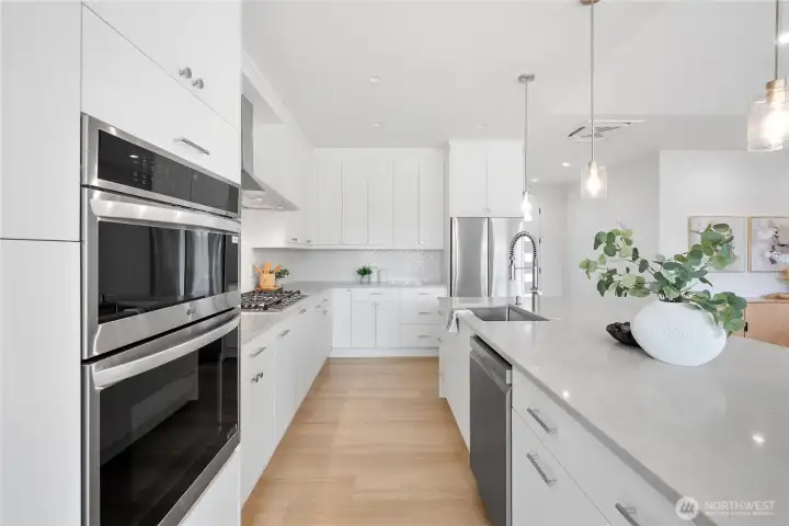 All LG stainless appliance package. Extra wide 5-burner cooktop, and separate oven & microwave. Under cabinet & toe-kick lighting.