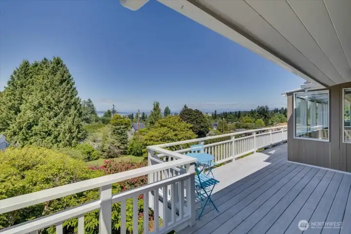 the deck spans the whole front of the home!