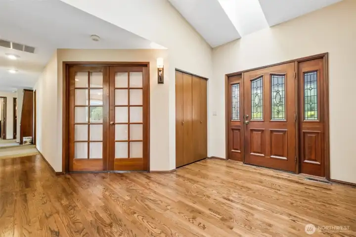 Back to the inside, as you enter the home check out these gorgeous - JUST refinished hardwood floors. There's an office/bedroom (has closet) in the left of this photo. Primary bedroom is at the front of the home, away from other bedrooms to the right of this photo. Back to the inside, as you enter the home check out these gorgeous - JUST refinished hardwood floors. There's an office/bedroom (has closet) in the left of this photo. Primary bedroom is at the front of the home, away from other bedrooms to the right of this photo.
