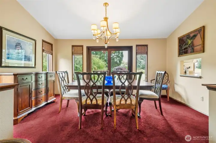Formal Dining Room with newer Anderson Frenchwood doors to the backyard. Newer light fixture is dramatic as well. Note the pass through to the kitchen for those large family gatherings. Formal Dining Room with newer Anderson Frenchwood doors to the backyard. Newer light fixture is dramatic as well. Note the pass through to the kitchen for those large family gatherings.