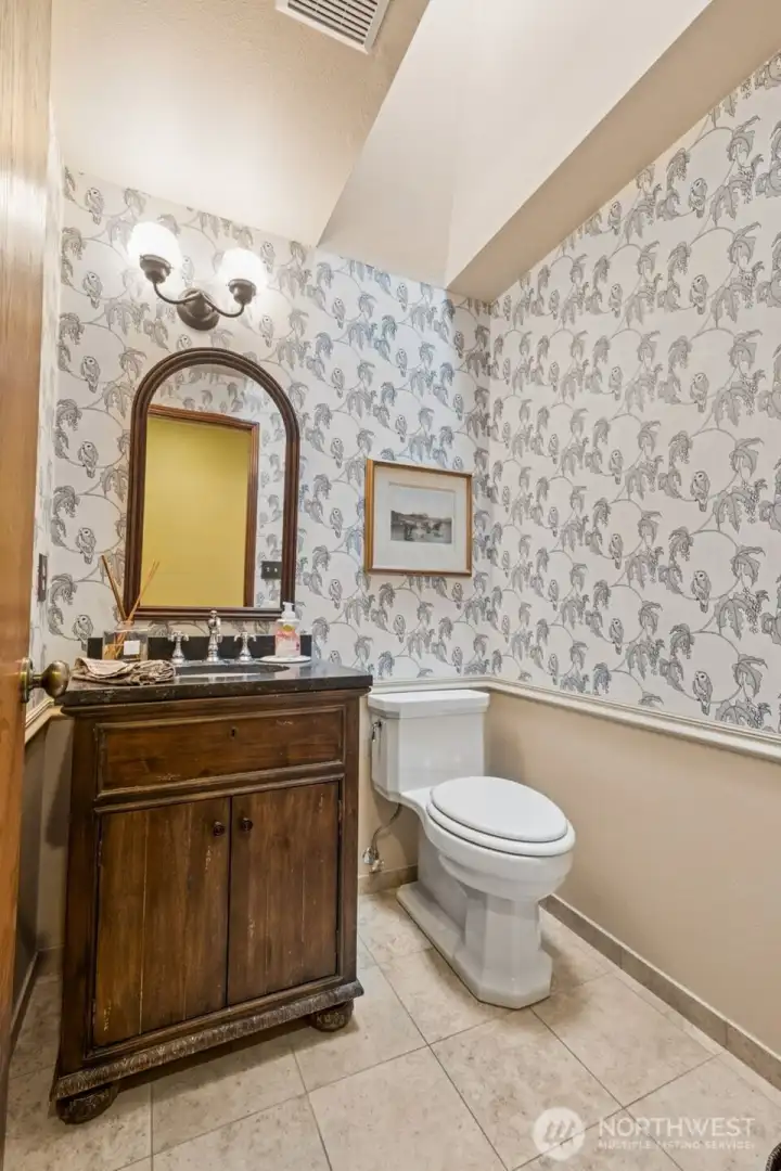 Powder Room remodeled with Restoration Hardware Vanity, new flooring, speciality wall paper. Current mirror will be replaced with something similiar before closing. Powder Room remodeled with Restoration Hardware Vanity, new flooring, speciality wall paper. Current mirror will be replaced with something similiar before closing.