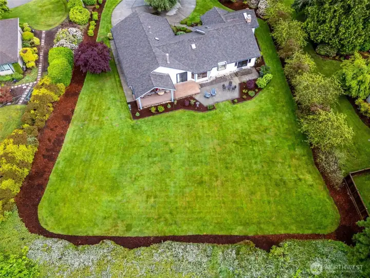 Dramatic drone view of the backyard. What a great space! Dramatic drone view of the backyard. What a great space!