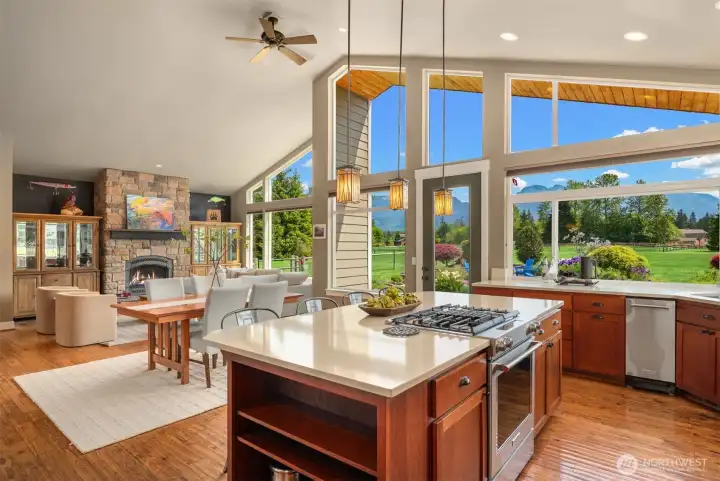 Hand-scraped hickory flooring throughout kitchen, living room, and dining room.