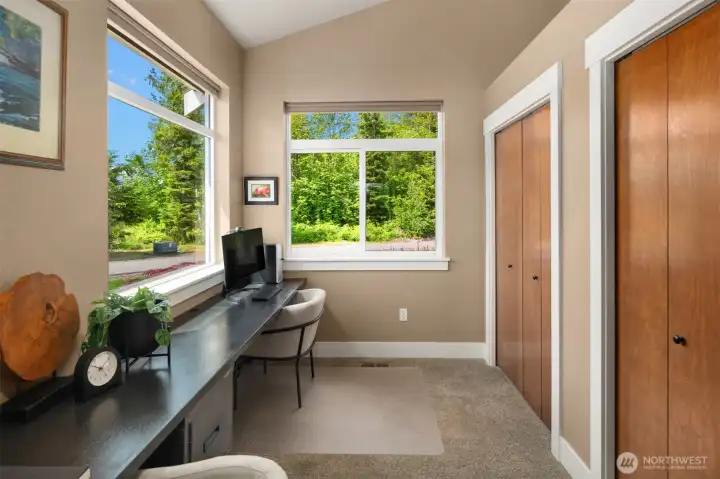 Located off the kitchen you'll find the office space. Two closets with plenty of storage could either be to keep extra pantry items for kitchen or whatever you decide!