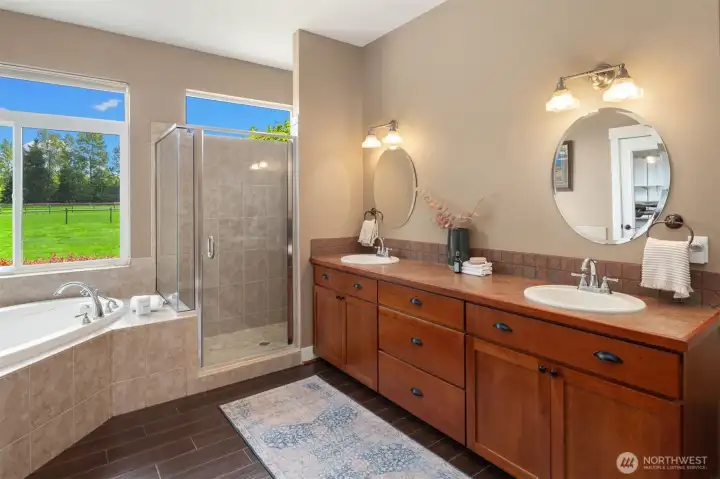Primary bathroom with heated floors and double vanity.