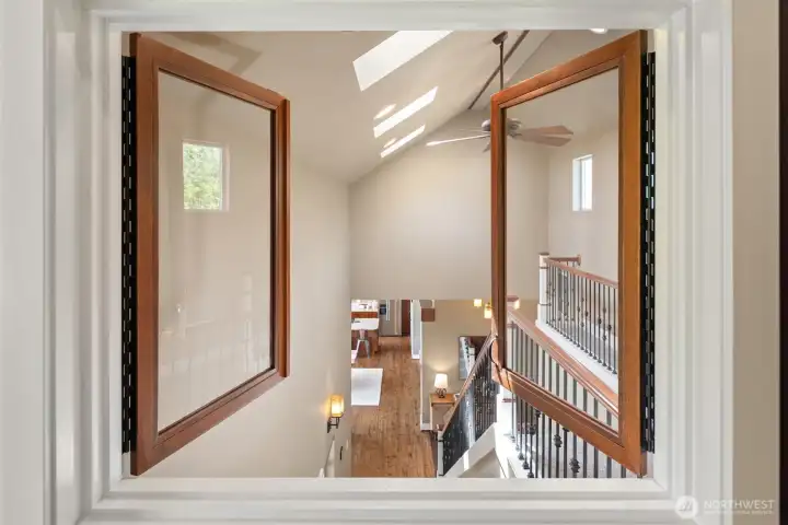 Bedroom #2 also has a fun window that looks down onto the main level!