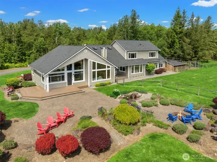 Back of home. Think of all the great ways you could entertain on the stone patio.