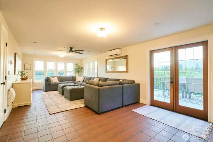 Gigantic family room. The room is so large that 2 sectional couch sets were put together to maximize seating. Gigantic family room. The room is so large that 2 sectional couch sets were put together to maximize seating.