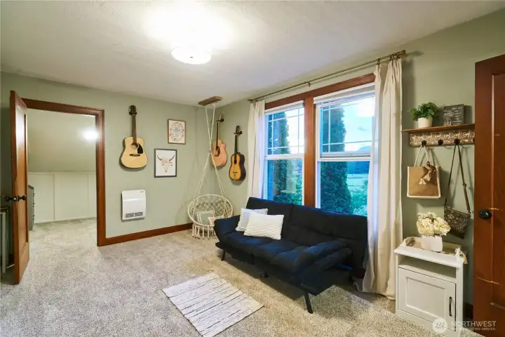 This bedroom upstairs has 2 large walk in closets. Both are currently being used as bedrooms and the middle area is more of an apartment living room. This bedroom upstairs has 2 large walk in closets. Both are currently being used as bedrooms and the middle area is more of an apartment living room.