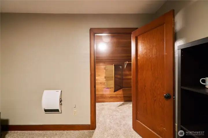 looking into the closet, the mirror has been pulled open to see the access to the secret room. looking into the closet, the mirror has been pulled open to see the access to the secret room.