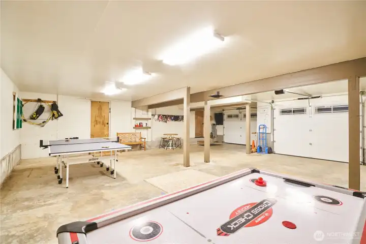 Oversized 2 car garage. Even with 2 cars in here there's still room for ping pong, air hocky and darts! Oversized 2 car garage. Even with 2 cars in here there's still room for ping pong, air hocky and darts!