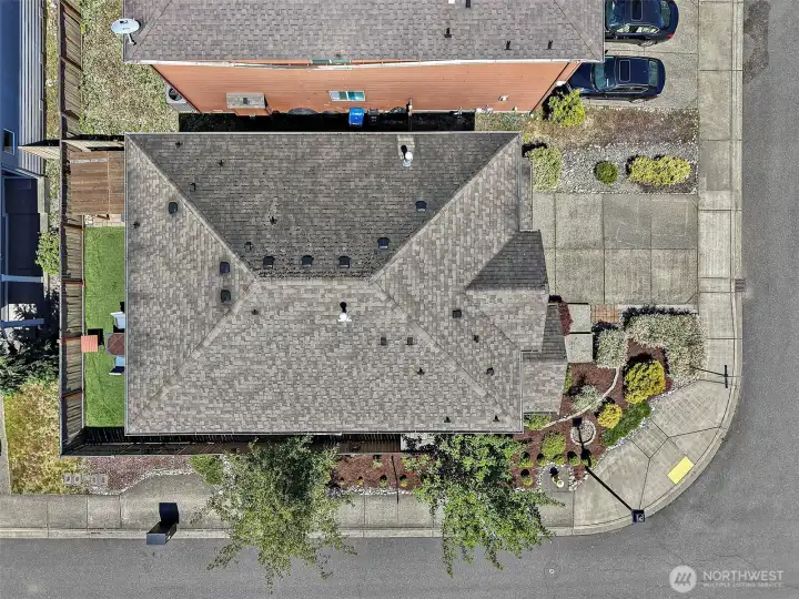 Aerial view showcasing the corner lot location and overall property footprint.