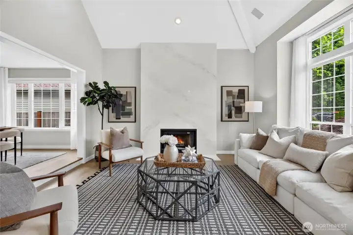Vaulted ceilings and a stunning Venetian fireplace. Vaulted ceilings and a stunning Venetian fireplace.