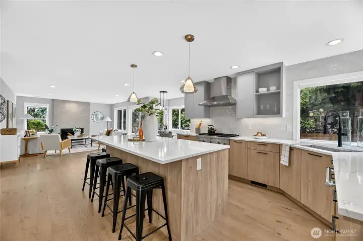 Stunning chefs kitchen opens to a informal dining space and family room. Stunning chefs kitchen opens to a informal dining space and family room.