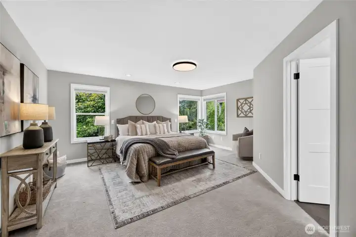 Double doors open to a spacious light filled primary bedroom. Double doors open to a spacious light filled primary bedroom.