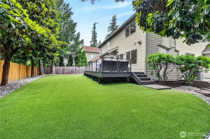 Low maintenace yard with high-end turf and trex decking. Low maintenace yard with high-end turf and trex decking.