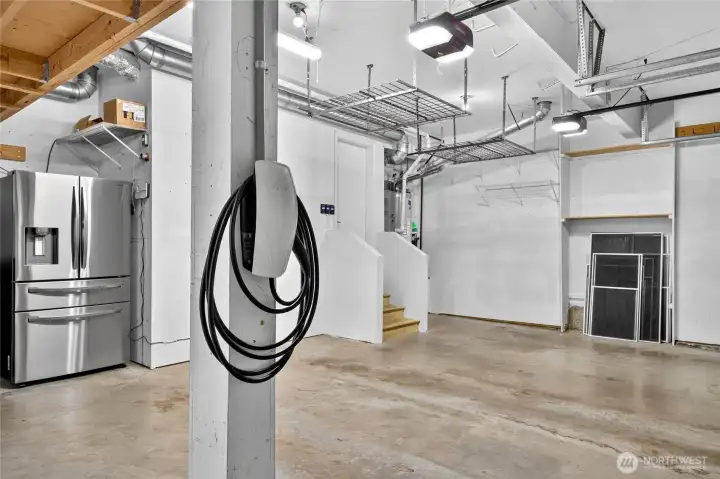 Oversized 3 car garage with overhead storage and Tesla electric charger in place! Oversized 3 car garage with overhead storage and Tesla electric charger in place!