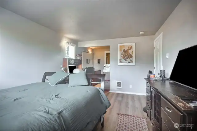 Primary bedroom facing bathroom