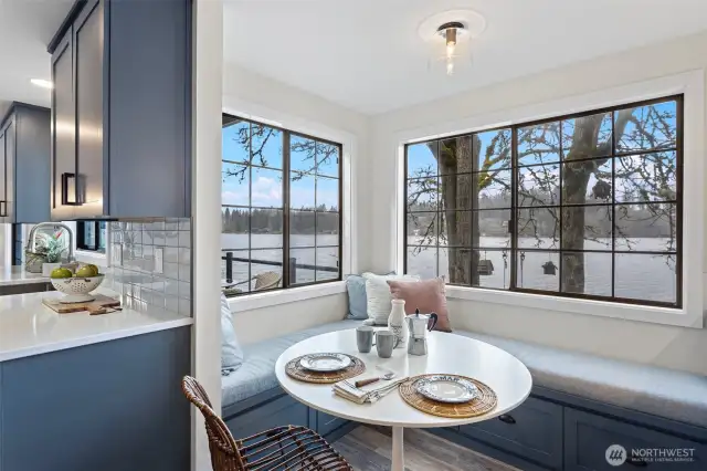 View kitchen eating area with built-in bench.