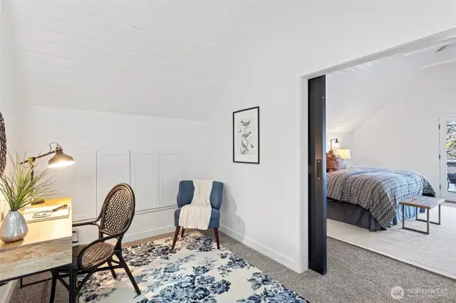 Upper floor office with built in storage.