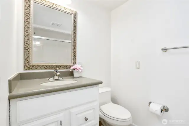 Primary bathroom with a tub.