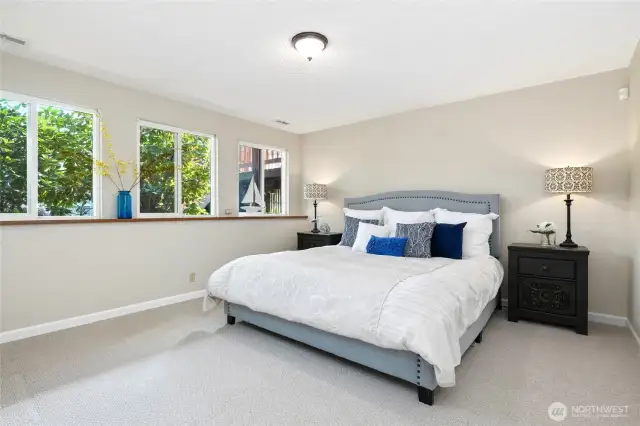 4th bedroom is on the lower level. It is large enough to comfortably fit a king size bed.