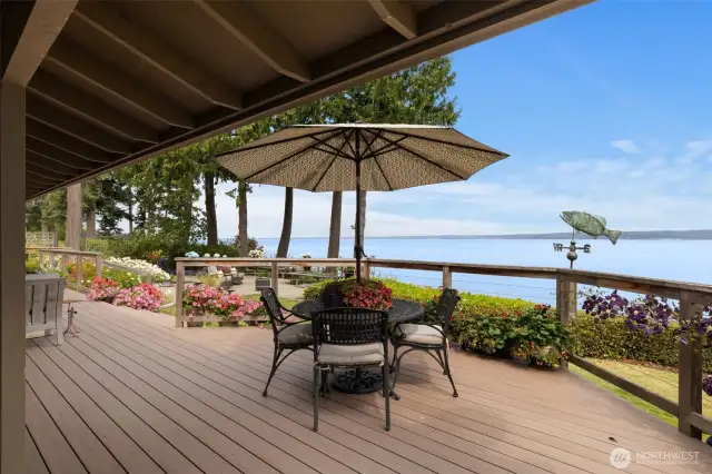 Stepping out onto the large wrap-around deck from Living  Room or Kitchen.