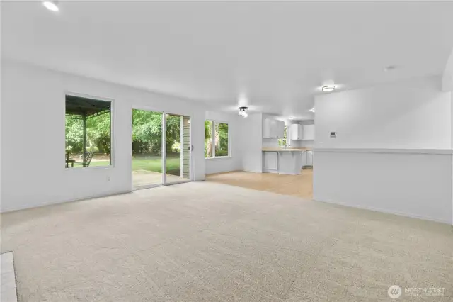 Family Room looking toward Kitchen & Backyard/Back Deck Sliding Door.