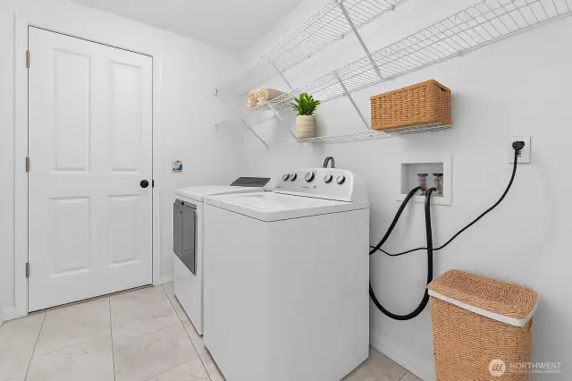 Utility Room off the Entry, leading into the Garage