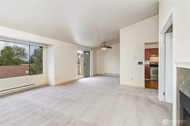 An open floorplan seamlessly flows into the dining area and kitchen.