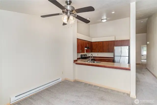 Dining space with slider that leads to your private balcony providing an abundance of light.